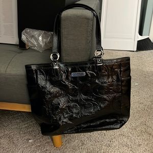 Black leather coach hand bag